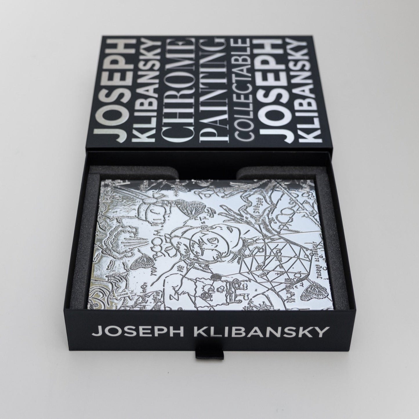 Joseph Klibansky collectible painting in a black box with white text on a light gray background